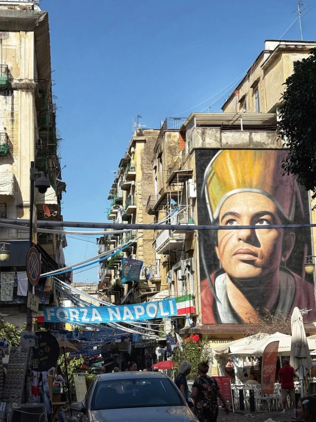 📍Napoli (Naples) Italy… the capital of southern Italy for over 1300 years, a very special place that balances life on extremes of the spectrums - tradition & superstition.
As you enter Napoli for the first time you may only notice the grittier, lived in, unkept appearances. But under that surface is a deeply historic and steadfast community of neighbors and family.
An ancient city that has endless archaeological treasures, remarkable architectural gems, and SO many surprising traditions. 
The high energy,narrow city center streets are more full of Neapolitans than tourists.Where speaking loud with a lot of bodily gestation is a love language!
Where the superstitions, folklore and ancient “traditions” are as much a part of everyday life as is attending mass in one of the over 500 churches to be found. 
Where locals adopt an ancient skull in the church crypt to visit it leaving tokens, saying prayers in hopes of some ethereal  message of blessings, good luck or fortune. 
Where on 3 holy days a year the ancient relic vial of St. Januarius preserved blood is taken from the vault and displayed for the crowds in hopes to find it miraculously liquified. A good omen for the city, with record keeping dating back to the 1400’s.. on years it has not catastrophes have occurred.
Where some of the most unbelievable lifelike marble statues are housed in a holy chapel surrounded by Christian allegory, Masonic secrets & 400 yr old mysteries (such as why the interior frescos never fade & only grow brighter over the centuries)
Where you can find a Banksy & a Caravaggio steps apart
Where a side street leads to 100’s of craftsmen in tiny shops are creating Christmas nativity scene elements year round. 
Where football & speaking your mind are as essential as breathing. 
Where certain foods really do only taste better like margarita pizza, Sfogliatella  pastries, the richest coffee you can imagine - maybe it’s the water but like everything else, it’s probably just Naples being her magical self
🤍 & how lucky for us to have our amazing local guide Ludavica, who probably said hello to over 20 locals and she shared her city with us!
#naples #napoli 
#italy 
#eatgoodlivewellenjoylife